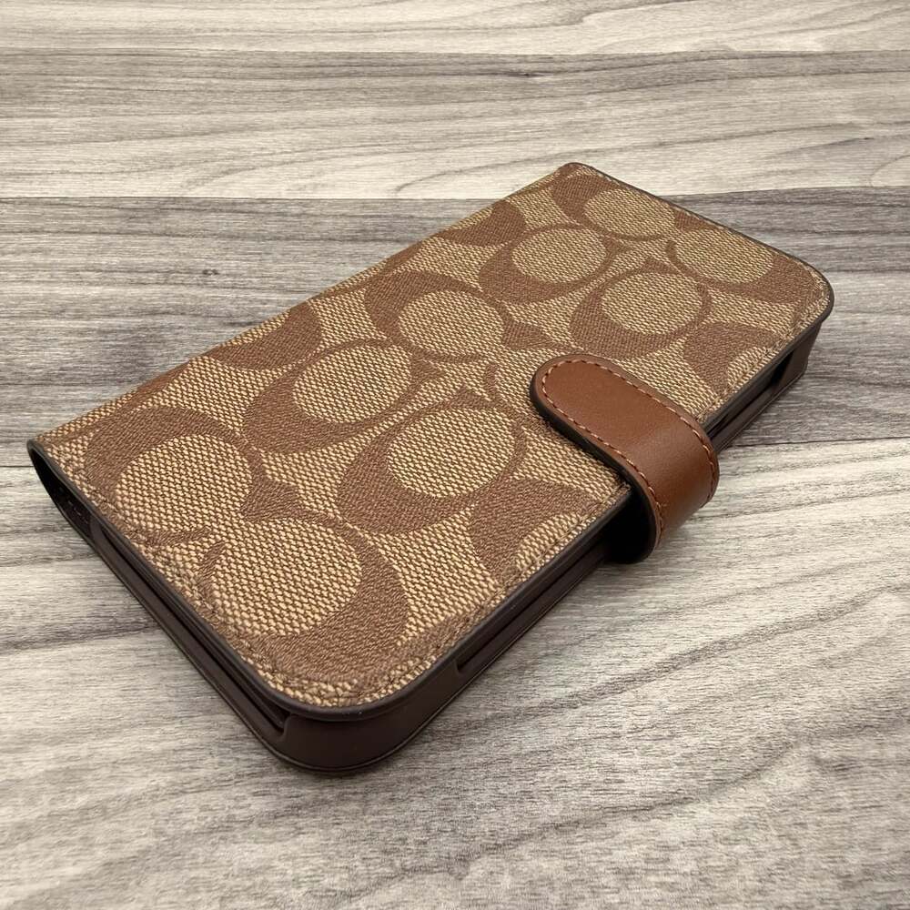 Coach Signature Canvas Phone Folio Case Brown fits iPhone 15 Pro